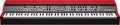 Red synthesizer keyboard with multiple knobs, buttons, sliders, and 88 keys in a clean product view.