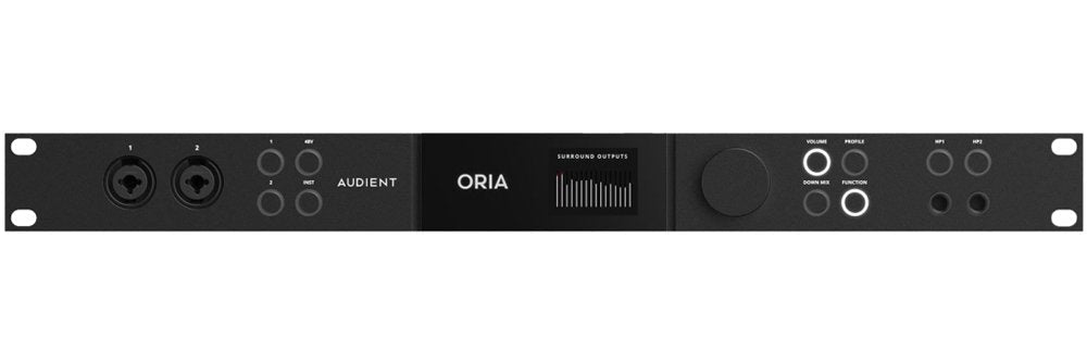Front panel of a black audio interface with combo input jacks, display, volume knob, buttons, and headphone jacks.