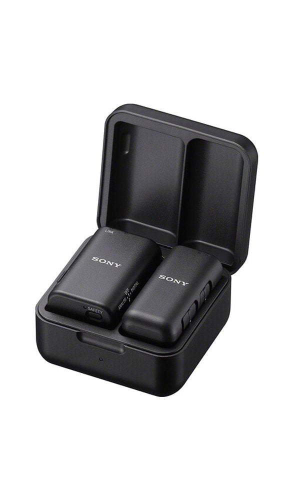 Two black Sony devices with buttons inside an open black charging case.