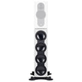 White and black floor-standing speaker with a white top section and four black circular speaker elements on a stand.