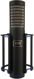 Black cylindrical microphone with metal grille and shock mount frame with blue elastic bands.