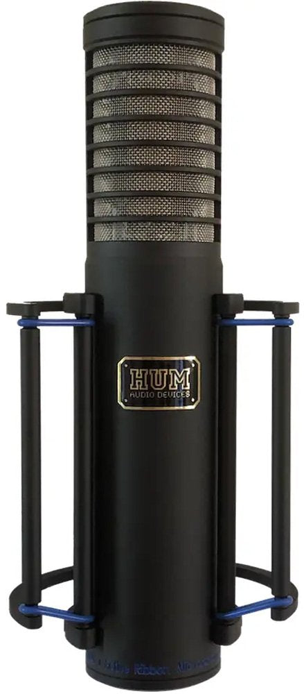 Black cylindrical microphone with metal grille and shock mount frame with blue elastic bands.