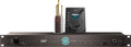 Rack-mounted Trinnov Nova device with a desktop controller and a probe with gold connectors on top of it.