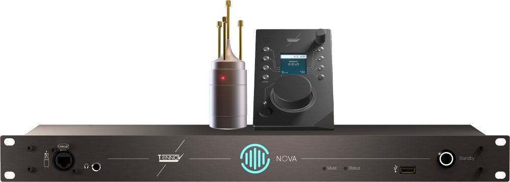 Rack-mounted Trinnov Nova device with a desktop controller and a probe with gold connectors on top of it.