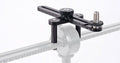 Black metal adjustable mounting arm with a knob and screw thread for attachment.