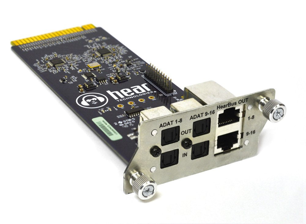 Circuit board with optical and ethernet-style ports labeled ADAT and HearBus by Hear Technologies.
