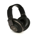 Black over-ear headphones with cushioned ear pads and branded with AKG logo on ear cups.