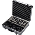 Open hard case containing five black microphones, cables, and microphone clips organized in foam insert.