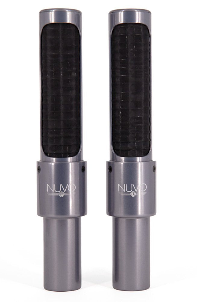 Two tall cylindrical microphones with gray metal bodies and black mesh fronts, labeled NUVO, standing side by side.