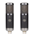 Pair of black cylindrical microphones with silver mesh grill and TELEFUNKEN logo on body.