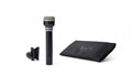 Black handheld microphone with silver mesh grille, clip, and black pouch with WA logo on white background.