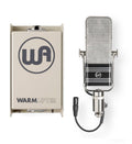 Silver and black vintage-style microphone with attached XLR cable and a beige WARM LIFTER box.