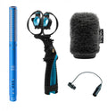 Blue Schoeps microphone with shock mount, fluffy windshield, and short adapter cable on white background.