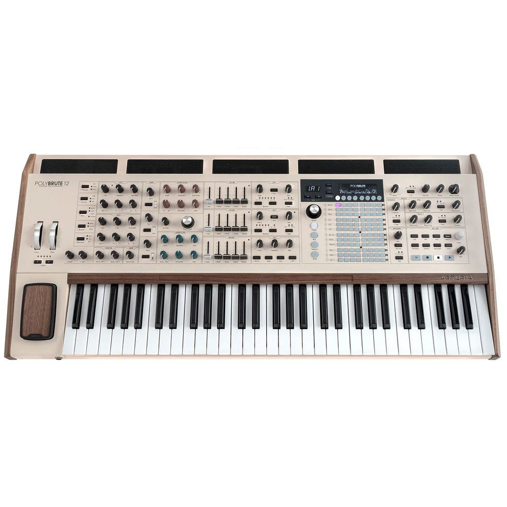 Beige keyboard synthesizer with multiple control knobs, sliders, buttons, and wheels including a wooden side panel and pitch/modulation wheels.
