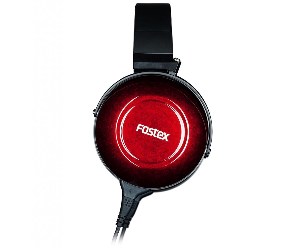 Close-up view of one side of over-ear headphones with red ear cup and Fostex branding.