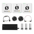 Three white wireless audio units with accessories including cables, windshields, and a carrying pouch.