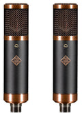 Two black and copper microphones with mesh heads and TELEFUNKEN logos shown side by side.