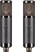 Two gray cylindrical microphones with metal mesh grilles and Telefunken logos, shown side by side.
