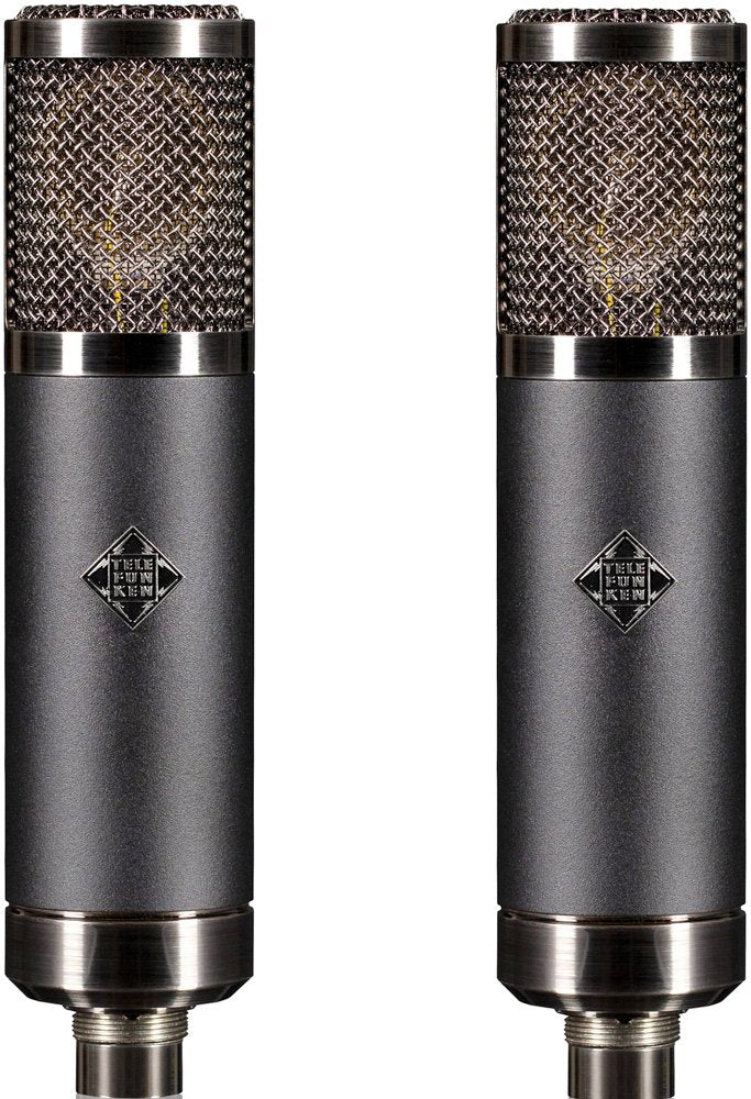 Two gray cylindrical microphones with metal mesh grilles and Telefunken logos, shown side by side.
