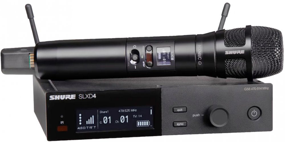 Black Shure wireless handheld microphone resting on a black wireless receiver with display and control buttons.