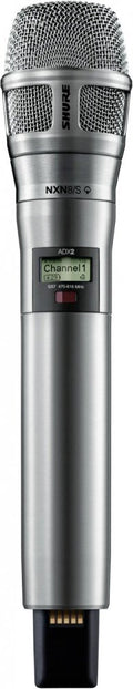 Silver handheld microphone with metal mesh grille, digital display showing Channel 1, and connector pins at the base.