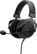 Black over-ear wired headphones with attached boom microphone and padded headband.