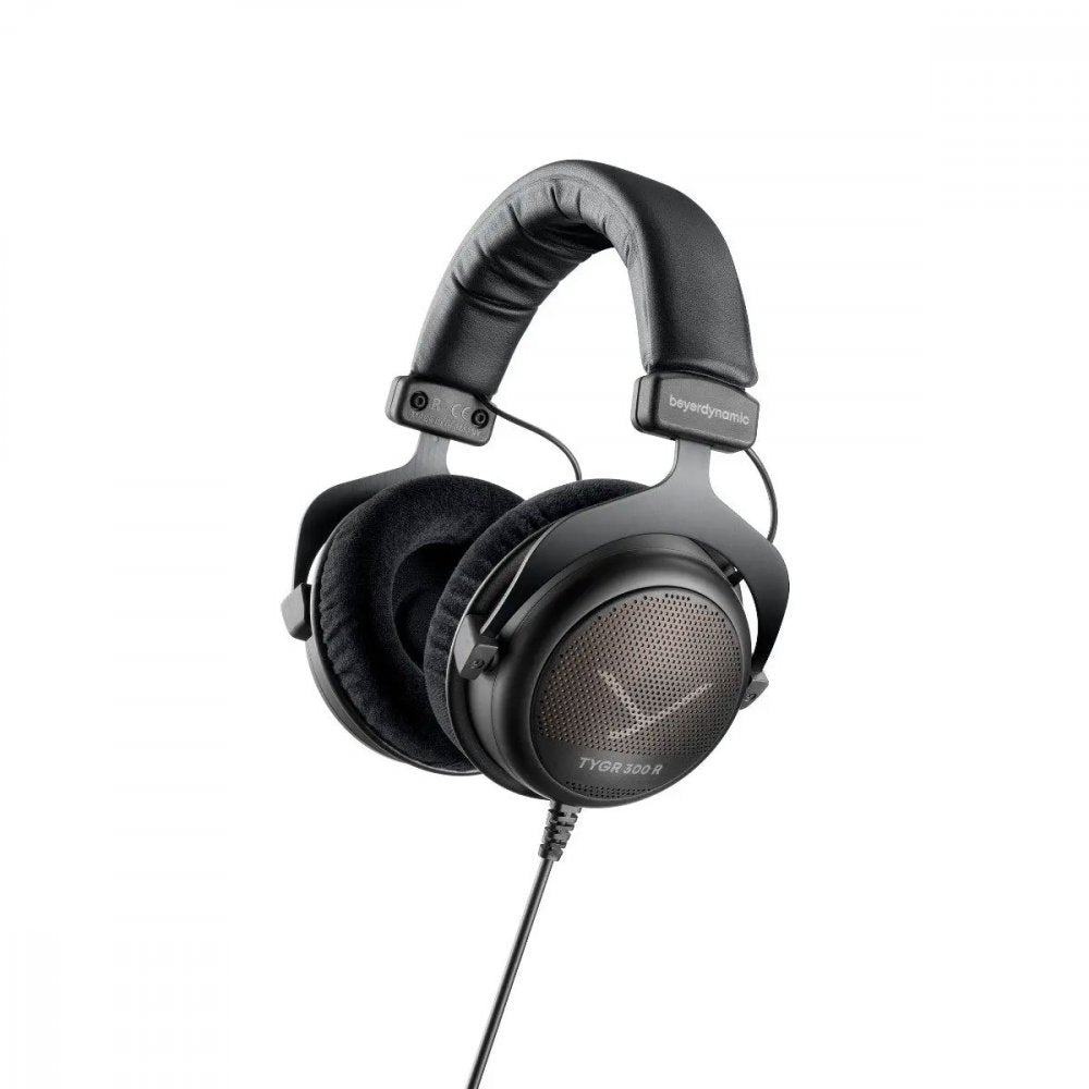 Black over-ear headphones with padded headband and cable connected to one earcup marked TYGR 300 R.