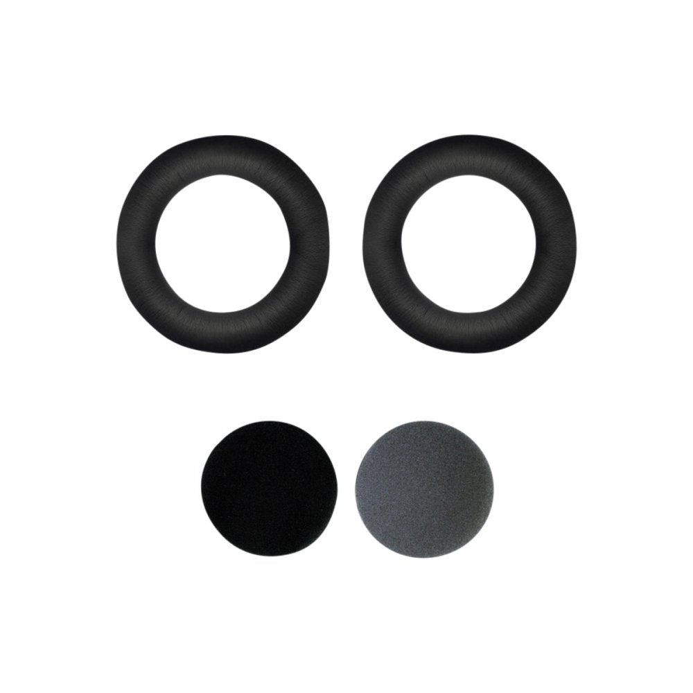 Two pairs of round ear pads and two foam covers for headphones on a white background.