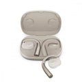 Cream-colored wireless earbuds with ear hooks and a matching charging case shown open.
