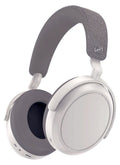White over-ear headphones with gray ear cushions and fabric headband with logo.