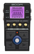 Black Zoom MultiStomp MS-80IR+ pedal with screen, four gold knobs, and multiple buttons and jacks visible