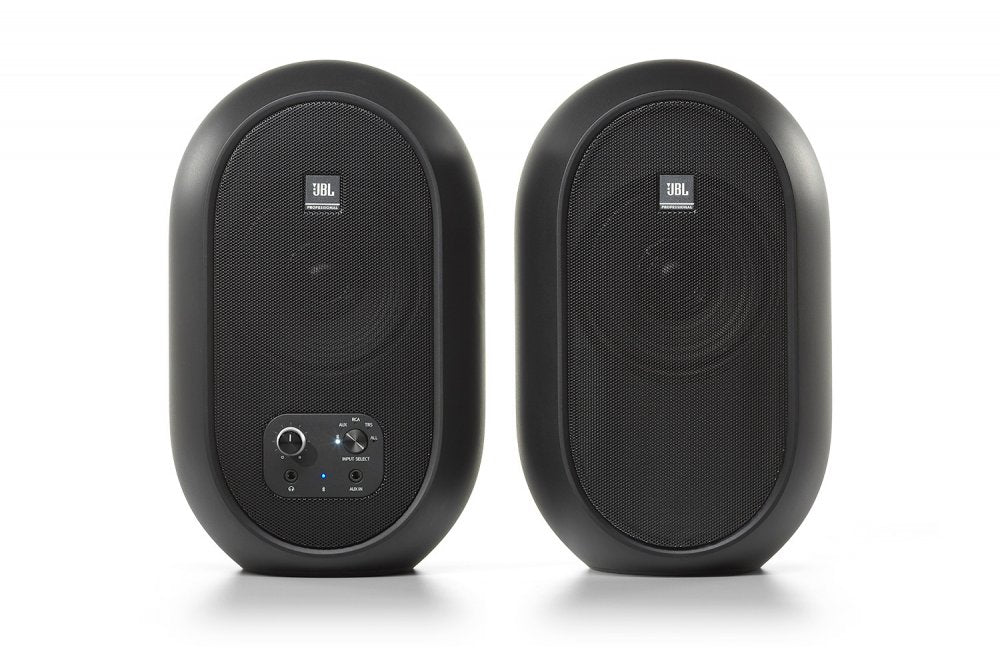 Front view of two black oval speakers with mesh grills and control panel on the left speaker.
