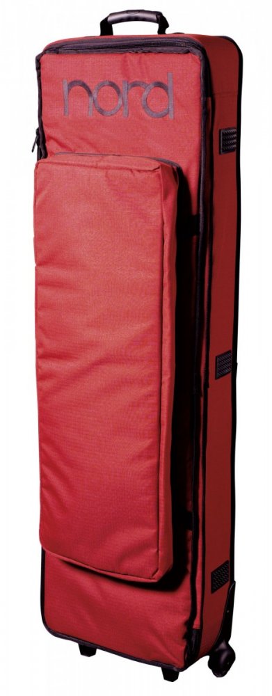 Red soft carrying case with wheel and handle, branded with 'nord' on front pocket