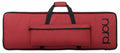 Red soft carrying case with black trim and a front pocket, marked with the Nord logo.