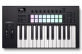 Black and white MIDI keyboard controller with knobs, colored pads, and various control buttons on a white background.