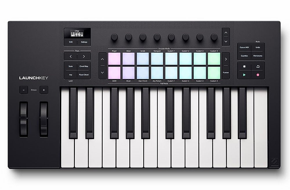 Black and white MIDI keyboard controller with knobs, colored pads, and various control buttons on a white background.