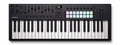 Black MIDI controller keyboard with 49 keys, knobs, faders, buttons, and color pads.