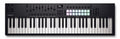 Black MIDI keyboard controller with 61 keys, 16 colored pads, faders, knobs, and small display.