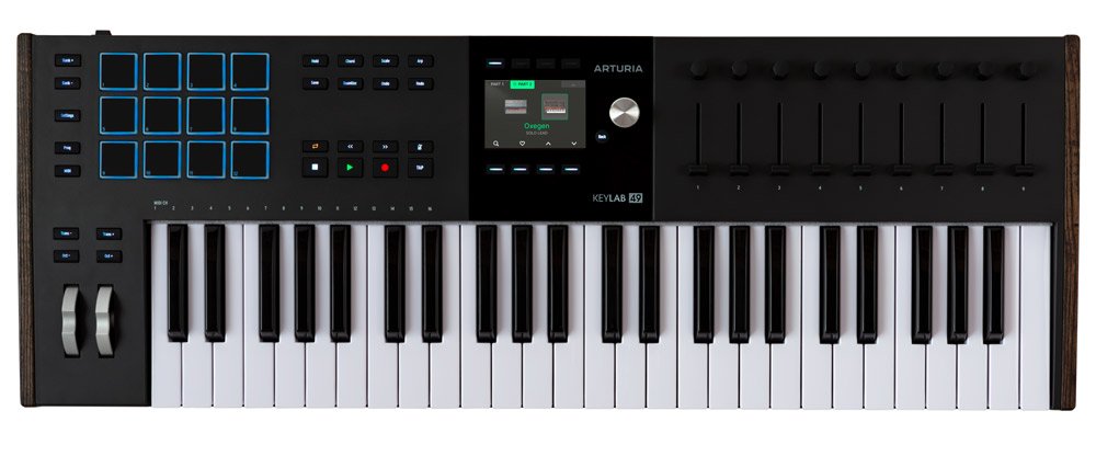 Black MIDI controller keyboard with 49 keys, pads, faders, knobs, and a central display screen.