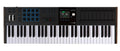 Black MIDI keyboard controller with 61 keys, pads, knobs, buttons, sliders, and a small display by ARTURIA.