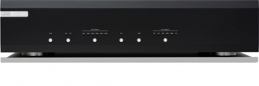 Front panel of a black audio device with multiple push button knobs labeled for phono stage and loading adjustments.