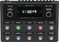 Black multi-effects processor with knobs, footswitches, and touchscreen interface displaying effect blocks.