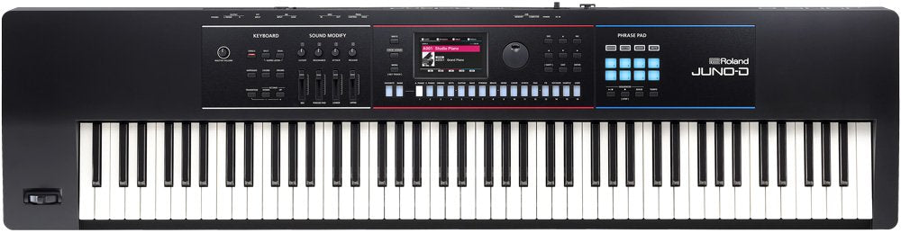 Black Roland JUNO-D keyboard synthesizer with 61 keys, sliders, buttons, a phrase pad, and a screen.