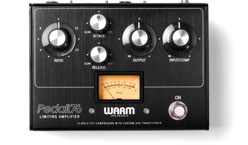 Black WARM AUDIO Pedal76 compressor pedal with four rotary knobs, VU meter, and footswitch on front panel.