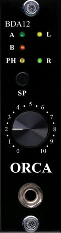 Front panel of a black ORCA audio device with LED indicators, a rotary knob, and one audio jack connector.