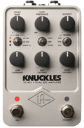Gray guitar effects pedal with six knobs, three toggle switches, two footswitches, and various labeled settings.
