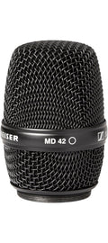 Close-up of a black metal microphone grille with the text MD 42 and part of the Sennheiser logo visible.