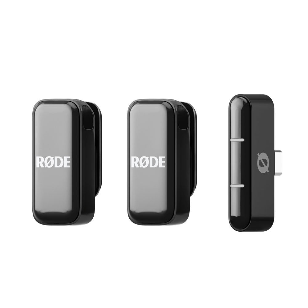Three small black RØDE wireless microphone components including two remotes and one Lightning connector unit.