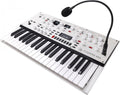 White and black synthesizer keyboard with multiple knobs, buttons, joystick, and a mounted microphone on a flexible arm.