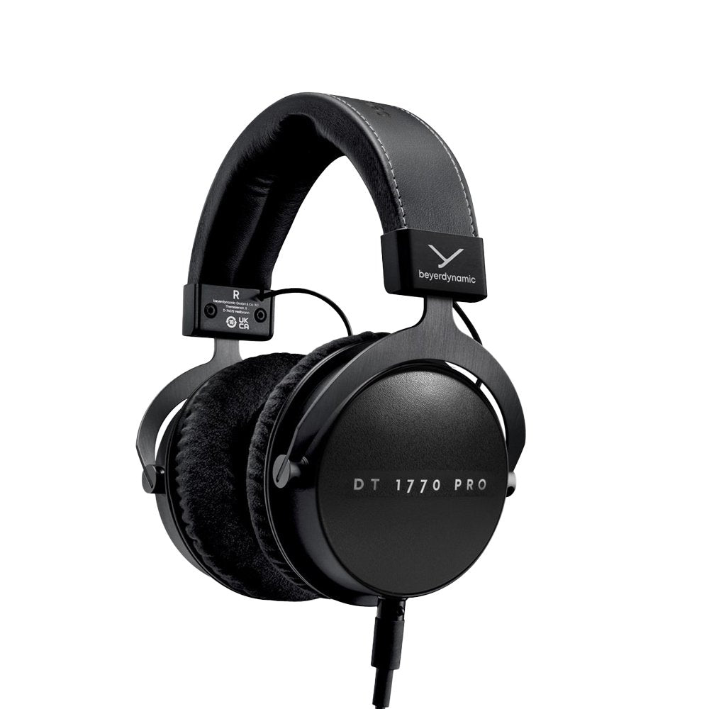 Black over-ear headphones with padded headband and ear cups, showing label DT 1770 PRO